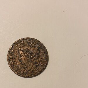 Vintage Coin with Profile Design